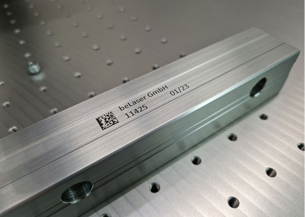 High-contrast laser marking on natural anodized aluminum without damaging the corrosion layer